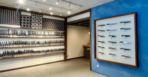 Blue-gray showroom interior at MUSASHI JAPAN France Blue Store with Japanese kitchen knife displays