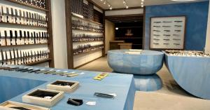 Paris-inspired retail space at MUSASHI JAPAN France Blue Store with blue display counters and Japanese kitchen knives