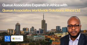 Judemark Bwari, Director of Queue Associates WorldWide Solutions Africa Ltd. in front of the Nairobi skyline.