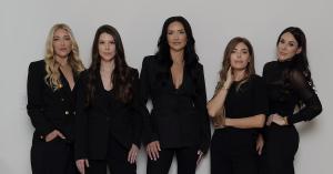 The five clinical providers of MODE Aesthetics and Wellness standing together at the medspa's North Scottsdale, Arizona office.