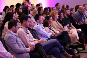 Audience of HR and talent acquisition professionals attending a keynote session at the ERE Recruiting Innovation Summit Fall 2026 in San Diego, listening to a speaker during a conference presentation.