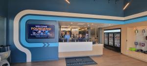 Greeters welcome visitors to the decorated front lobby