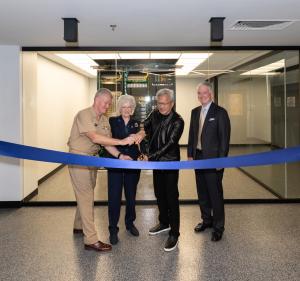 U.S. Navy Adm. Samuel J. Paparo, commander, U.S. Pacific Command; retired Vice Adm. Ann E. Rondeau, president of the NPS; Jensen Huang, founder and CEO of NVIDIA; and Hank Plain, board chair of the NPS Foundation unveiled the DGX GB300.