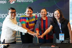 MicroSourcing Group's CFO and CEO with Clark Development Corporation’s VP for Business Development and Enhancement and the DOLE Regional Satellite Office’s Officer-in-Charge.