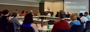 Executive Director Libba Pinchot addresses participants during Innovera's Roundtable at PNW Climate Week