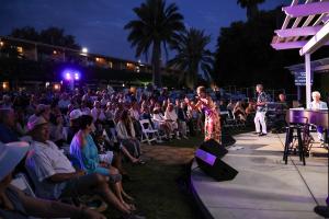 Vocalist Niki Haris captivates the audience during the Eric Marienthal & Friends benefit concert, accompanied by saxophonist Eric Marienthal and renowned jazz pianist David Benoit. Proceeds from the evening supported the High Hopes Head Injury Program.