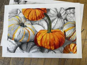 A Thanksgiving-themed greeting card design depicting pumpkins