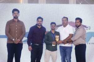 Top-performing student receiving an award at the felicitation ceremony of HSIM Digital Business Summit 2026