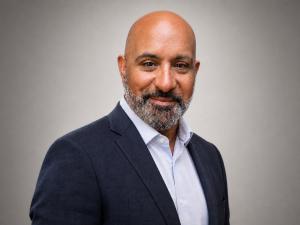 Headshot of Alan W. Garcia, Director of Asset Management and Relocations at Krieger Scientific, a life sciences compliance and technical solutions firm