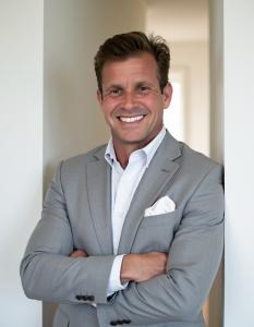 Headshot of Justin Kane, Head of People at Krieger Scientific, a life sciences compliance and technical solutions firm