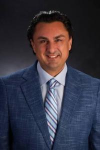 Dr. Tarek Assi's headshot