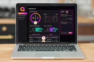 Picture of a MacBook Pro displaying QuarqAI's new platform.