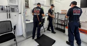 Little Elm firefighters inside an air-conditioned MobileOp4 mobile cooling station used for first responder rehab in Texas heat
