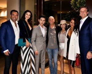 Hideaki Kuo with filmmaker Martin Campbell and guests at a Hollywood film investment gathering.
