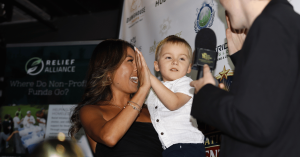 Aiden McNally interviewing Emerald Lockett and her son on the red carpet at National Parents Day 2026 hosted by Wealth Strategy Media and Relief Alliance, highlighting families and community leadership.