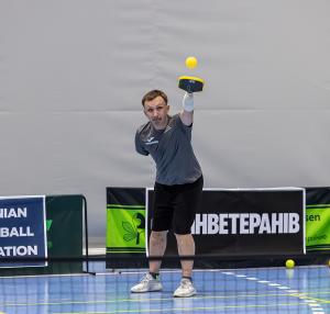 Oleksandr Dehtiar, a Ukrainian combat amputee veteran, holding a pickleball paddle at the First Ukrainian Veterans Pickleball Championship in Kyiv, 2026.