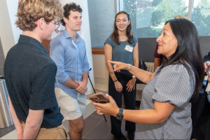 7x24 Exchange DC Chapter Executive Director Lillian Rivera meets with the 2026 college scholarship recipients.