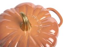 Close-up of the Harvest Pumpkin Dutch Oven lid in Harvest with a gold stem handle.
