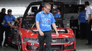 Josh Sisco and the RFK team walk out the #17 car.