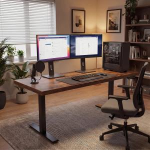 71-inch electric standing desk in a modern home office with dual monitors, desktop PC, keyboard, ergonomic chair, and organized workspace setup for remote work.