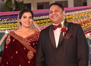 Michael Thomas and Praisey Thomas, née Yesudas, at their wedding reception on March 27, 2025, at the Cross Ground in Itarsi, Madhya Pradesh, India (wedding ceremony held at PCG Church).
