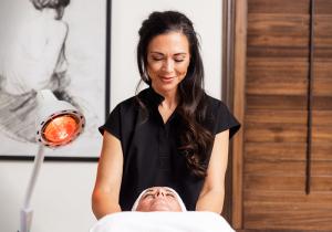A photo of a medspa owner with an elevated brand that encourages patient loyalty