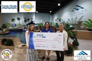 Cody Pools & American Pools and Spas present a $41,181 donation to Baby Otter Swim School following the 2026 Sunshine Classic Golf Tournament.