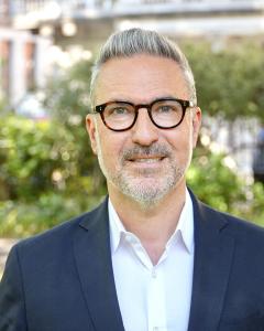 Showing image of Ozgur Tuncer, CEO & Exectutive Director