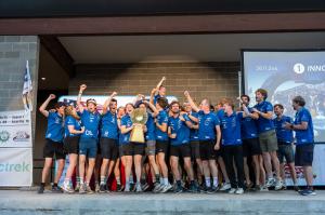 KU Leuven Raise the Award for the SOV Class, Team Raises Gold Trophy on Stage