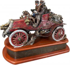 Hand-painted polychrome bronze sculpture by Stanley Wanlass (American, b. 1941-) depicting the 1903 San Francisco to New York City automobile endurance run. Estimate: $8,000-$14,000