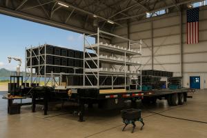 Macrovey Mobile Warehouse System, a deployable autonomous warehouse featuring robotics, intelligent storage, and automated order fulfillment.