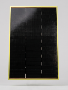 The SOURCE MOD-0015-02 space solar module: black shingle-matrix silicon cells in a yellow frame, with copper busbar leads exiting each side, shown against a light grey studio background.