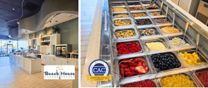Interior of Beach House Frozen Yogurt shop with a self-serve topping bar featuring fruits, nuts, and candies.