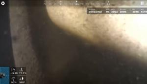 CHASING M2 S underwater ROV approaches a submerged white pickup in an Ohio reservoir.