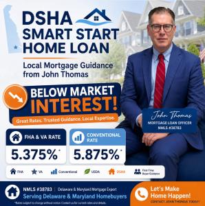 Delaware home buyers reviewing loan options at a lending office desk — DSHA Smart Start Home Loan — John Thomas Team, Newark DE