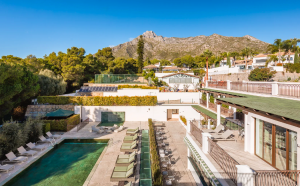 Exterior view of Oasis Premium Recovery's residential addiction treatment facility in Spain, showing the building and surrounding grounds.