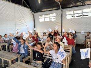Photo of students in their classroom at Life for Relief and Development’s (LIFE) Al Mal Tent School in Gaza.