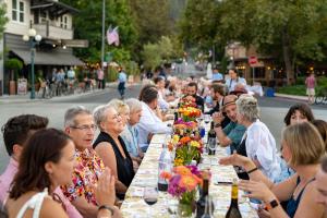 Guests dining at a table outdoors