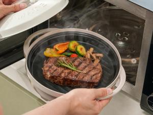 Steak and vegetable cooked in the RANGEMATE Signature Microwave Grill Pan