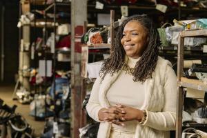 Natasha Broxton photographed inside Select Auto Parts & Sales, an indoor automotive recycling facility in Milwaukee.