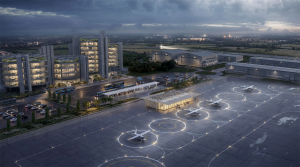 An aerial view of the passenger terminal with aircraft to one side, and a bus loop on the other.