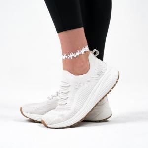 Isla Anklet in White Verdasil on woman wearing sneakers and leggings.