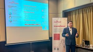 Even Koh presenting a company introduction to attendees at Novotel Kuala Lumpur
