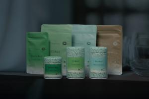 Photo of Daily Matcha products from Zenkyu Matcha. Front 3 tins are Signature Blend, Uji Blend, Hika Blend (from left to right), back are pouches for refill.