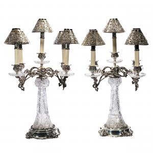 Magnificent American Brilliant Cut Glass pair of five-light candelabra – known as “The Liberace" – featuring a well-cut hobstar and swirled prism motif. Estimate: $2,500-$5,000
