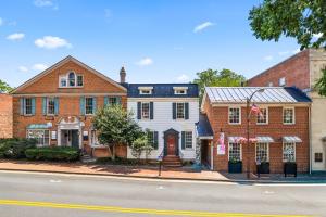 3 attached commercial buildings w/13 parking spaces -- 2 of the buildings are currently income producing -- All Zoned B1 -- Located directly across the street from the historic Loudoun County Courthouse Complex -- Located on E Market St. (Rt. 7)