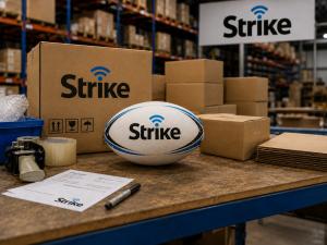 Strike-branded rugby ball on a packing bench inside Strike Group Australia’s Northgate warehouse in Brisbane.