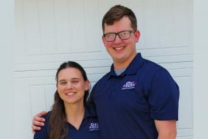Oxi Fresh franchisees Chris and Sara Olson pose together in their Oxi Fresh polos.