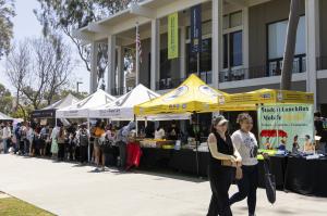 Students and families visit the Student LunchBox Mobile Market at CSU Long Beach to receive fresh produce, groceries, clothing, and basic needs support through a campus-based food access program in Los Angeles County.