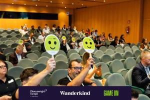 Audience members voting during the 2026 Global Startup Pitch at Phocuswright Europe in Barcelona.